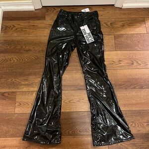 Shiny Black high rise flare pants #gothstyle
Retail 26.99